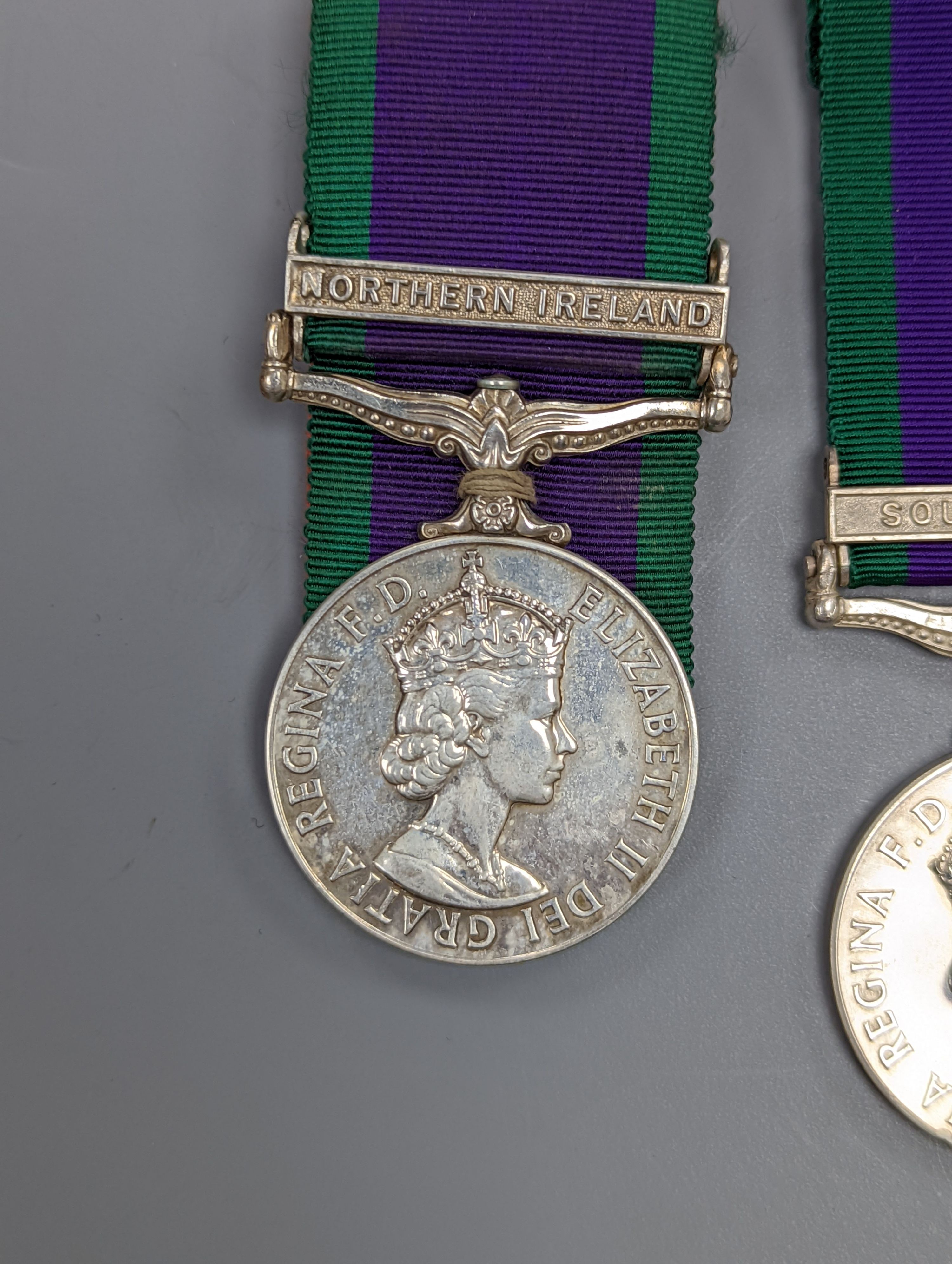 Five QEII GSM, three with a Northern Island clasp (one with UN medal), and two with South Arabia clasps